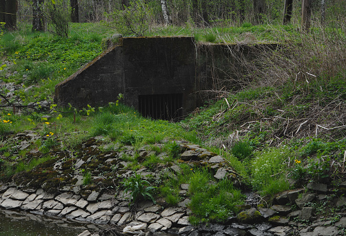 haunted underground entrance, canal water outlet