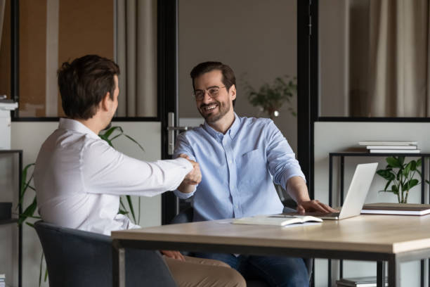 istock Employer, boss hiring candidate after successful job interview 1395769879