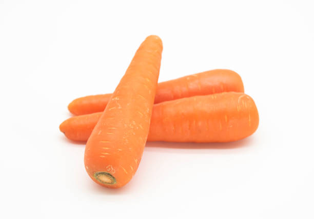 three Carrots isolated on white background. front view stock photo