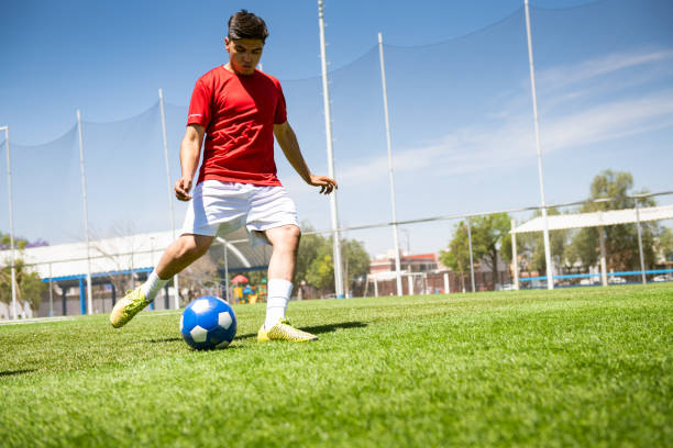 istock Soccer player kicking penalty 1395774252