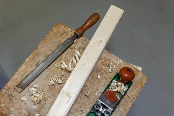 istock planer, file and wooden block on a stool 1395784042