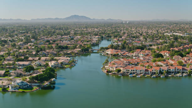 istock Aerial View of Housing Developments on Artificial Lake in Gilbert, Arizona 1395786265