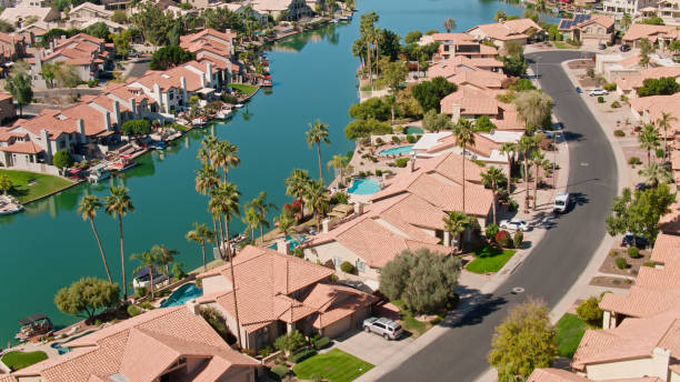 istock Artificial Lake and Waterfront Community in Gilbert, Arizona - Aerial 1395786310