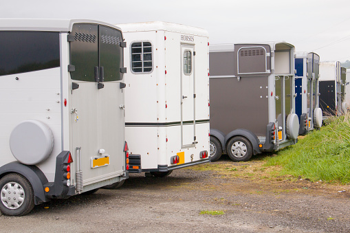 Row of horse transporters. Horse boxes are used to safely move horses around the country.