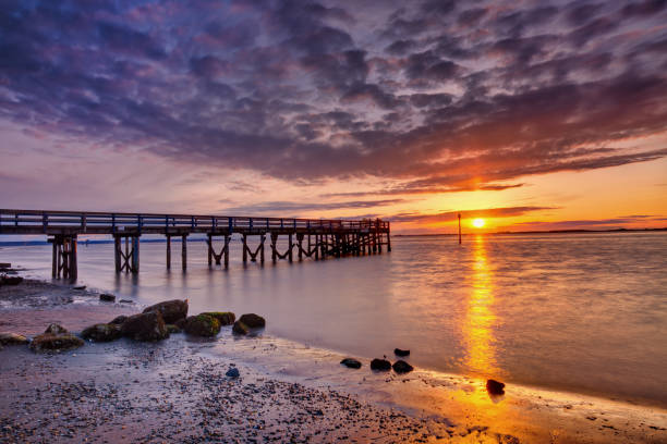 istock Beach and pier at sunset, Surrey, BC, Canada 1395792462