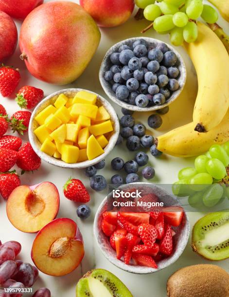 Fresh Fruit And Berries Stock Photo - Download Image Now - Fruit, Chopped Food, Fruit Bowl