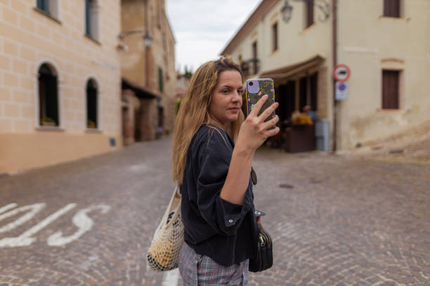 istock Female tourist taking selfies 1395796336