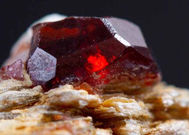 istock garnet  mineral specimen stone rock geology gem crystal 1395796534