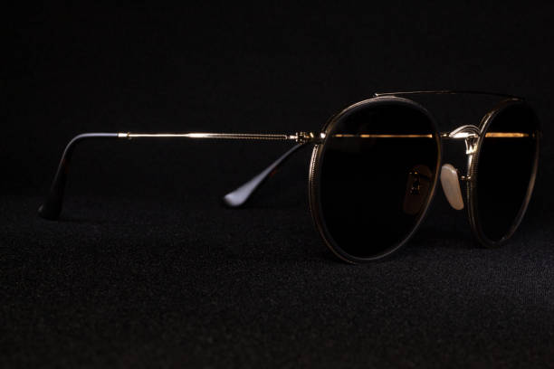 istock Fancy glasses seen from the side on a black background 1395805967