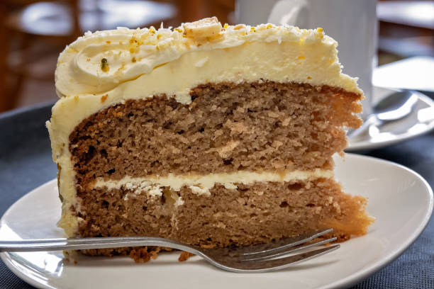istock Slice Of Carrot Cake With Icing 1395805979