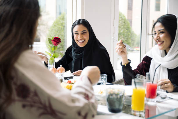 istock Young Saudi women enjoying lunch in Riyadh restaurant 1395810580