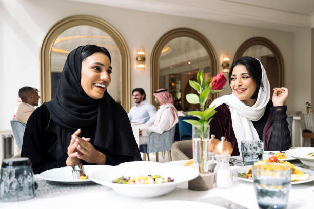 istock Cheerful Saudi women having lunch at Riyadh restaurant 1395810581