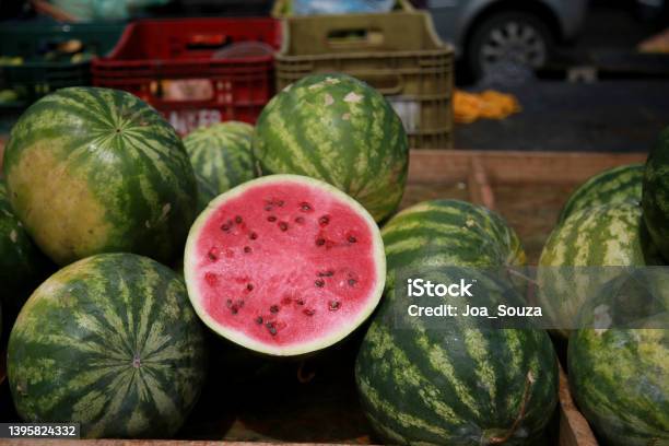 Watermelon For Sale At Fair Stock Photo - Download Image Now - Watermelon, Halved, Fruit