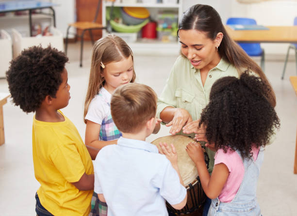 istock Shot of a woman teaching her class about musical instruments 1395831597