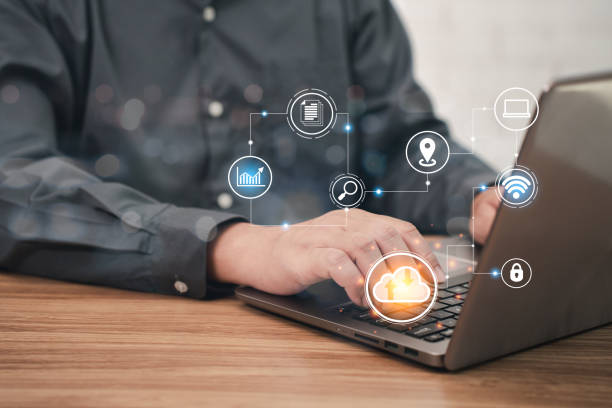 istock Business man use laptop Searching information data on internet networking in cloud technology data storage and uses smartphone connect to internet, texture and copy space 1395832470