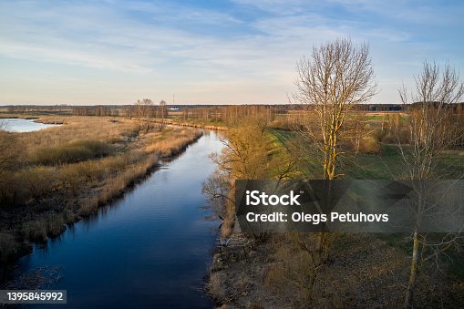 istock Summer landscape with small lake in forest 1395845992