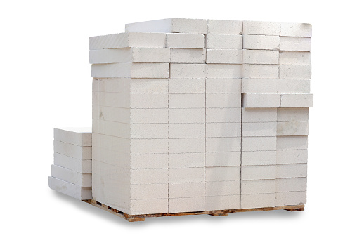 Stacked of lightweight construction brick isolated on white background with clipping path.