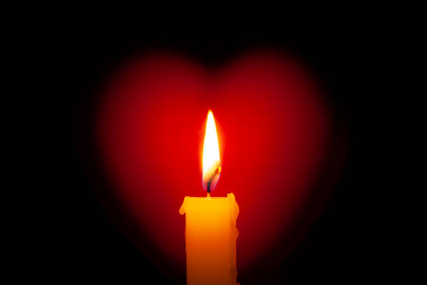 Candle with heart stock photo