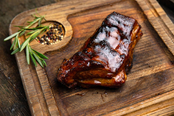 istock grilled meat steak on a wooden board with spices 1395852491
