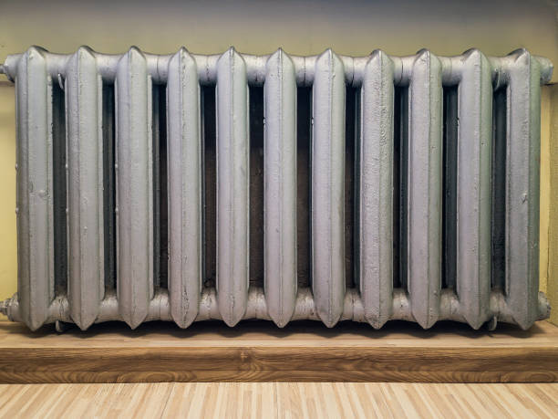 istock Cast iron radiator heat the room. 1395853340