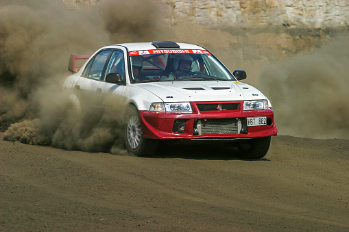 Falköping, Sweden - May 01, 2015: Rally Car on a skid on a dusty dirt road