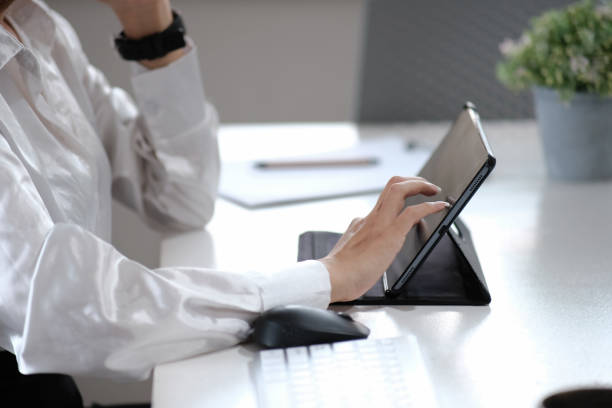 istock Closeup of a woman's hands typing on a computer keyboard, a businesswoman or a student using a laptop, the concept of online learning, internet marketing, and freelance 1395854696