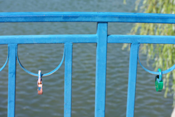 railing over pond at dry sunny summer day