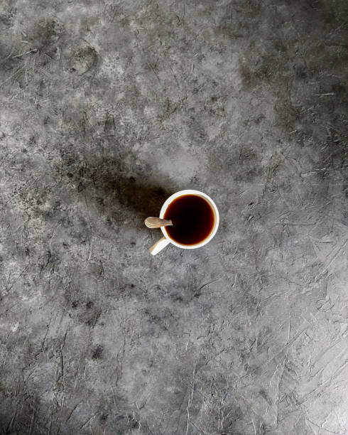 istock Cup of coffee on a dark background. 1395863039