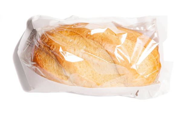 istock White bread in a paper bag isolated on white background 1395863884