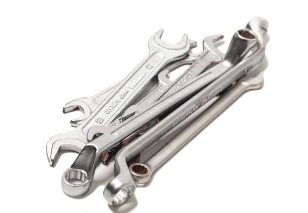 Many wrenches. Set of wrenches in different sizes isolated on white background.