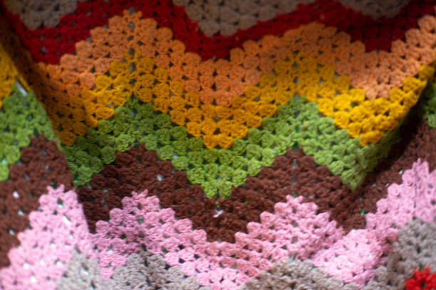 istock Grandma's plaid. Colored fabric. Knitted fabric. 1395864233