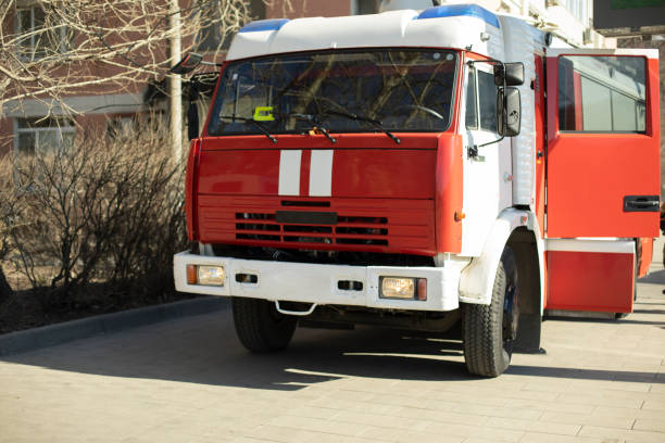 Fire truck on street. Rescue service. Special transport for extinguishing fire. stock photo