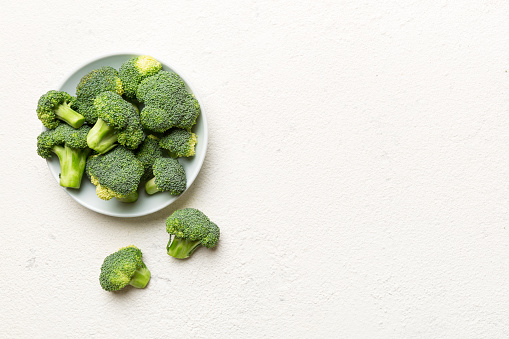 broccoli of fresh green broccoli in bowl over coloredbackground. , close up. Fresh vegetable.