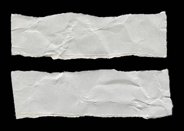 istock Cut or torn paper background textured isolated 1395866404