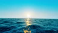 istock Slow motion, calm open sea at sunset, copy space, empty template for social media post and story 1395867642