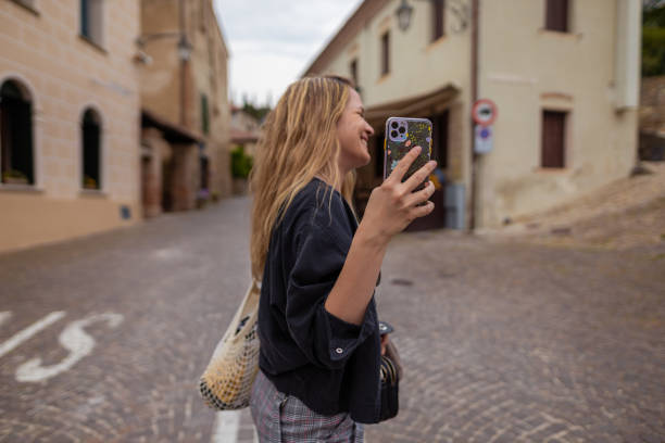 istock Female tourist taking selfies 1395868688