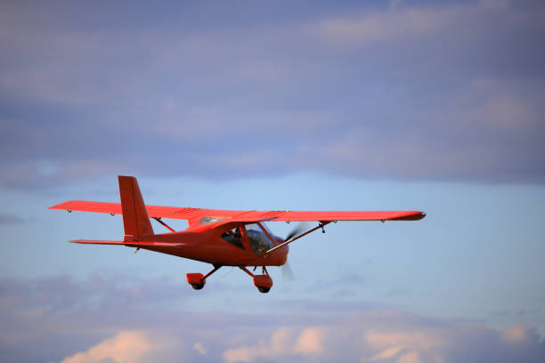 istock Small private propeller plane flies in the sky 1395869698