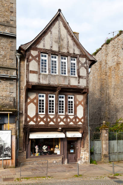 Half-timbered house in Guingamp Guingamp, France - May 04 2022: The oldest half-timbered house still standing on the Place du Centre. guingamp brittany stock pictures, royalty-free photos & images