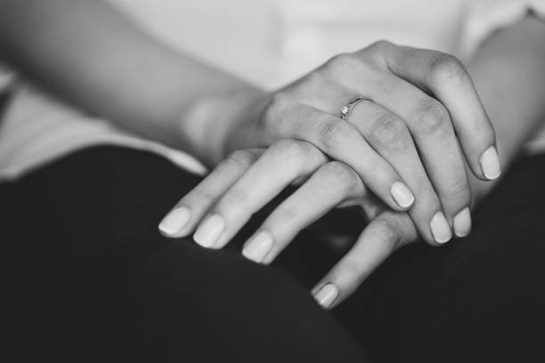 istock Engagement ring on young girl's finger. 1395876679