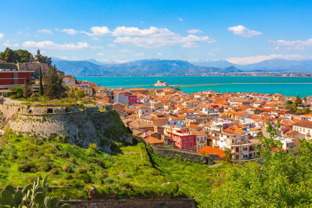 istock Nafplio, Greece aerial view and snow mountains 1395880816