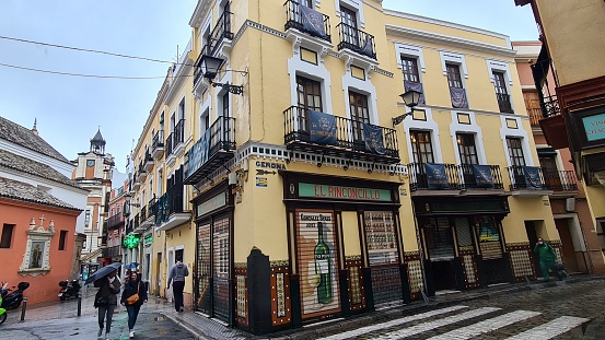 Sevilla, Spain – March 13, 2022: Traditional street buildings in the center of Seville.