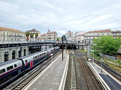 TGV Train at Montpellier-Saint-Roch station just departing. The image was captured during spring seaosn.