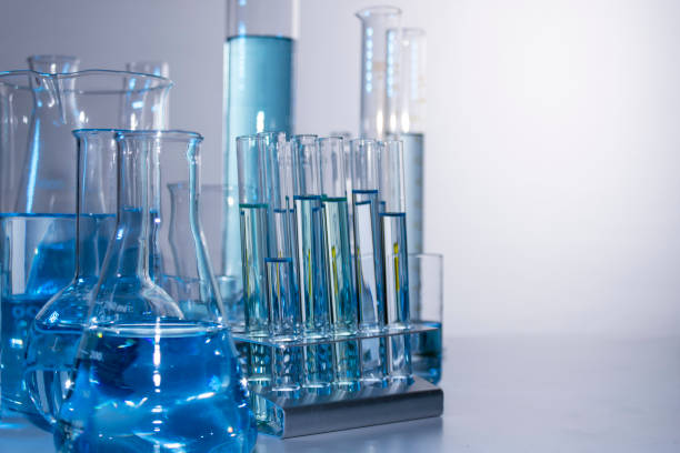 istock Close up of labware such as beaker, flask, graduated cylinders and test tubes well placed 1395887893