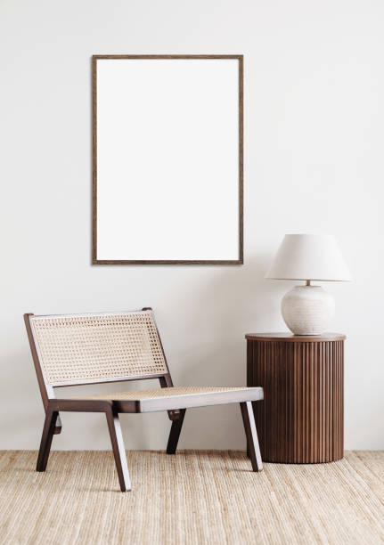 istock Artwork mock-up in interior design. Blank vertical picture frame on a wall 1395889168