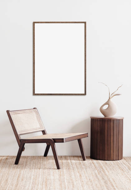 istock Artwork mock-up in interior design. Blank vertical picture frame on a wall 1395889172