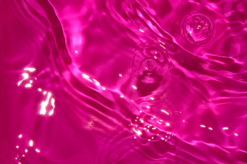 purple abstract water background, creative summer design, drop in the water