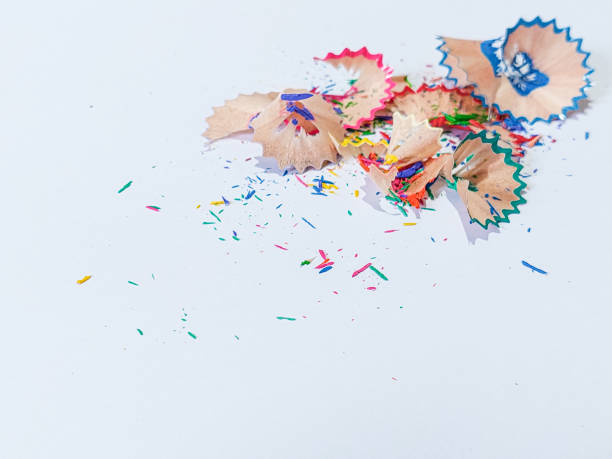 istock Shavings from multicolored pencils on white background 1395900279