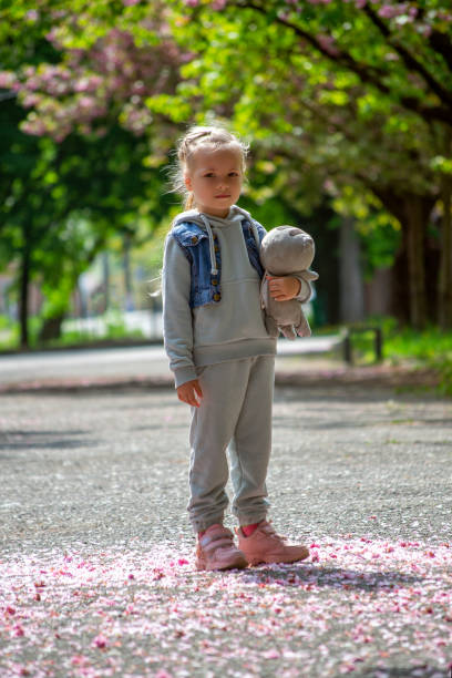 istock young girl in a park 1395900514