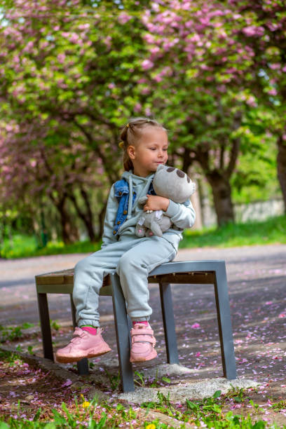 istock young girl in a park 1395902380