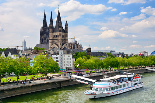Promenade and Rhine River in Cologne, Germany. Composite photo